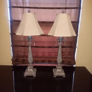 Photo of A PAIR OF MATCHING METAL BASE TABLE LAMPS
