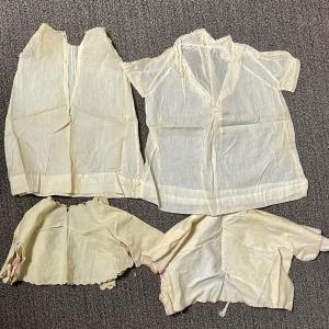 Photo of Lot of antique vintage baby doll clothes