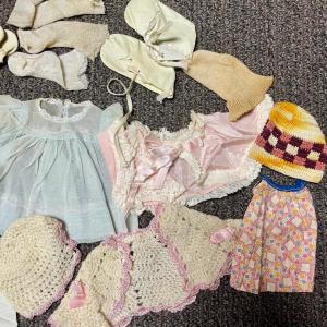 Photo of Small doll size clothing dresses, socks shoes, hats, sweater, etc