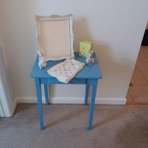 Photo of SMALL SIDE TABLE WITH DRAWER, WICKER STAND AND MISC DECOR