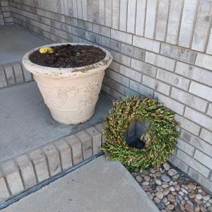Photo of A LARGE LIGHTER WEIGHT PLANTER AND FAUX FOLIAGE WREATH