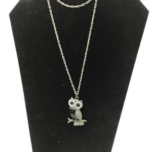 Photo of Gray and black owl necklace