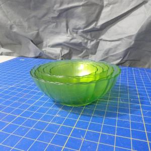 Photo of Green Glass Serving Bowls and Yellow Platter