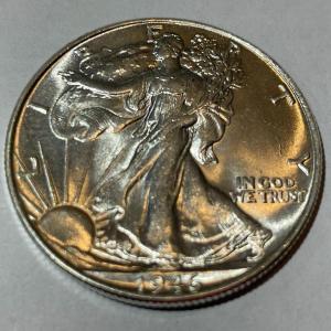 Photo of 1946-P CHOICE UNCIRCULATED CONDITION WALKING LIBERTY HALF DOLLAR AS PICTURED.