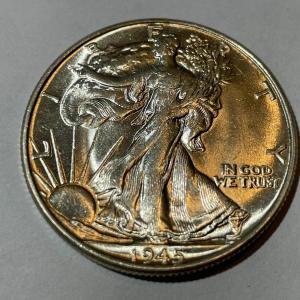 Photo of 1945-P UNCIRCULATED CONDITION WALKING LIBERTY HALF DOLLAR AS PICTURED.