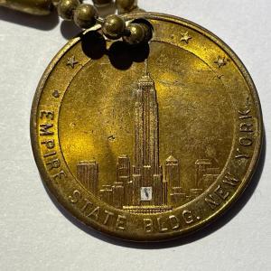 Photo of Vintage New York Empire State Building / Statue of Liberty Brass Keychain in Goo