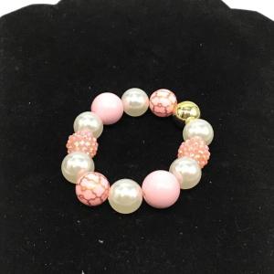 Photo of Pink and white beaded designs bracelet