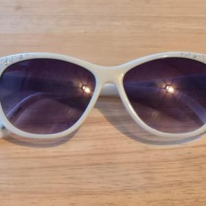 Photo of White and Rhinestone Sunglasses