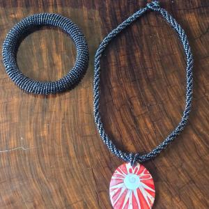 Photo of Black Bead Bangle and Necklace with Shell Pendant
