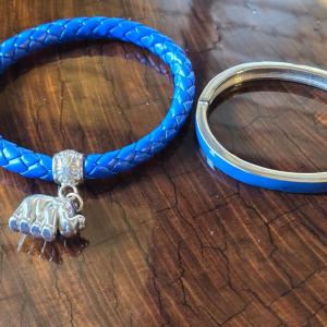 Photo of Woven Blue Bracelet with Elephant Charm and Silver Tone & Blue Enamel Hinged Ban