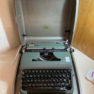 Photo of Olympia typewriter in case