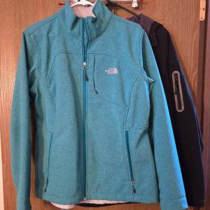 Photo of North Face Turquoise Zip Up and Avia Black Zip Up Jackets