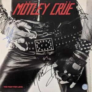 Photo of Motley Crue Too Fast For Love Signed Album. GFA Authenticated
