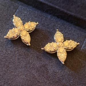 Photo of 14k White Gold Floral Earrings