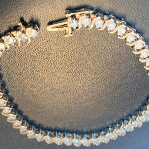 Photo of 7” 14k Gold / Diamonds Tennis Bracelet