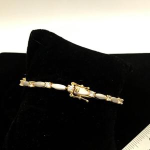 Photo of Beautiful, Gold Tone Locking Tennis Bracelet