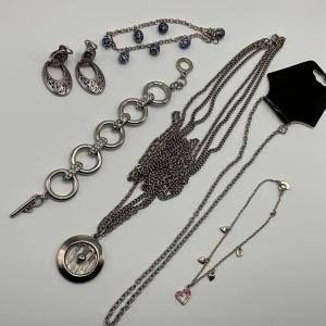 Photo of Silver group of jewelry, necklaces, earrings, bracelets