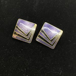 Photo of Black, purple and GT vintage clip on earrings