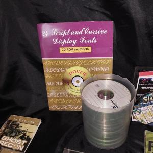 Photo of COMPUTER GAMES-BLANK CD'S AND SCRIPT/CURSIVE FONTS BOOKLET