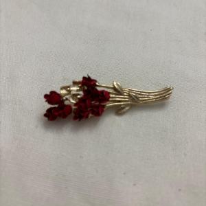 Photo of DM 97 vintage gold Tone pin of dozen red roses
