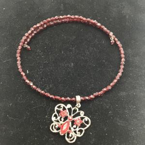 Photo of Red beaded wrap around bracelet with butterfly charm