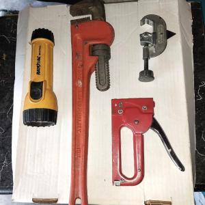 Photo of HAND TOOLS PIPE WRENCH-PIPE CUTTER-STAPLER AND FLASHLIGHT