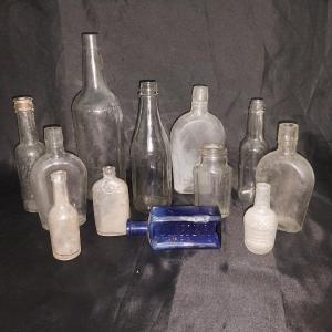 Photo of NICE VARIETY OF VINTAGE GLASS BOTTLES