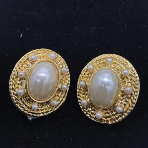 Photo of Vintage gold tone and faux pearl clip on earrings
