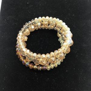 Photo of "Dragon Crystal", Peach, Very Pale twist around bracelet