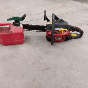 Photo of Homelite Ranger Chain saw - Power stroke 33 cc Engine with gas can