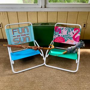 Photo of LOT 105 P: Travel Rain Or Shine: Folding Beach Chairs, Umbrellas, & Vintage Amel