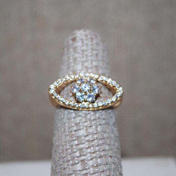 Photo of Size 6 Side Positioned Oval Ring with Lots of Gold Points on a Gold Tone Band (4