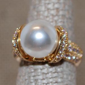 Photo of Size 7 Large White Faux Pearl Ring with Side "Rings" Accents on a ,925 Gold Tone
