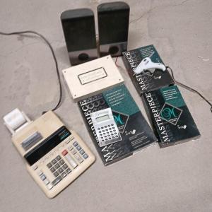 Photo of Office items - Card stock - post cards - speakers - adding machine - glue gun an