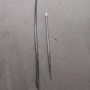 Photo of Two pry bars - steel bars one long one short