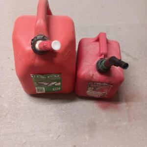 Photo of Two gas cans 5 gallon and 2-gallon mixed fuel can