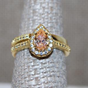 Photo of Size 7¼ Light Orange Pear Cut Ring with Surrounds and a 2 Ring Set (4,7g)