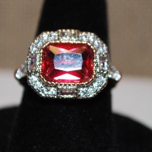 Photo of Size 6¼ Red Side Rectangle Stone Ring with a Frame Style Glitter Setting on a R