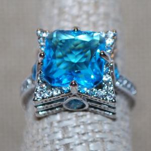 Photo of Size 7 Pretty Blue Stone Ring on Unique Triple Levels Setting and Silver Tone Ba