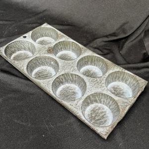 Photo of Granite ware muffin tray
