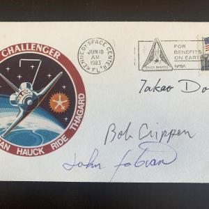 Photo of Astronauts Takao Doi and John Fabian and Bob Crippen signed first day cover