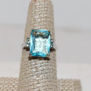 Photo of Size 7¼ Large Clear Blue Emerald Cut Stone Ring with 6 Tiny Accent Stones (5.1g