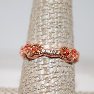 Photo of Size 9 Clear Stone Bridge Style Ring with Pink/Orange Side Stones (2.5g)