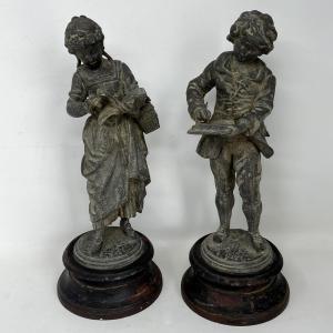 Photo of Cast Iron Antique Boy & Girl statues