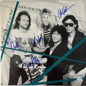 Photo of Van Halen signed "When it's Love" album