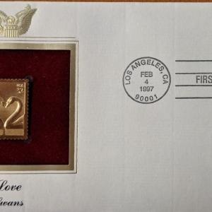 Photo of Love Swans Gold Stamp Replica First Day Cover