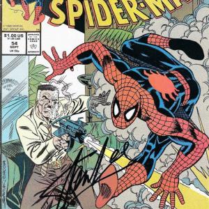Photo of Stan lee signed Spiderman comic
