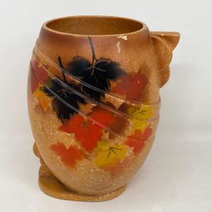 Photo of English Fall motif art pottery vase.