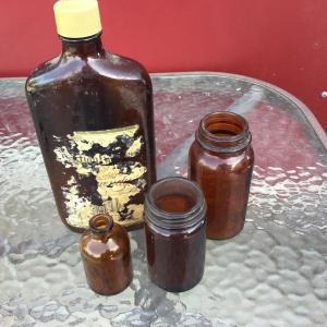 Photo of Set of 4 Brown Bottles
