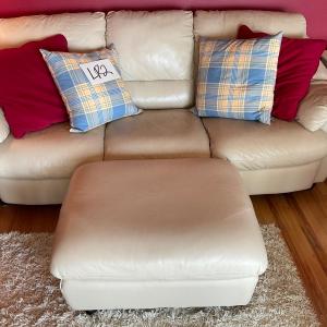 Photo of LR2-Leather Sofa w/ 4 pillows and ottoman on wheels
